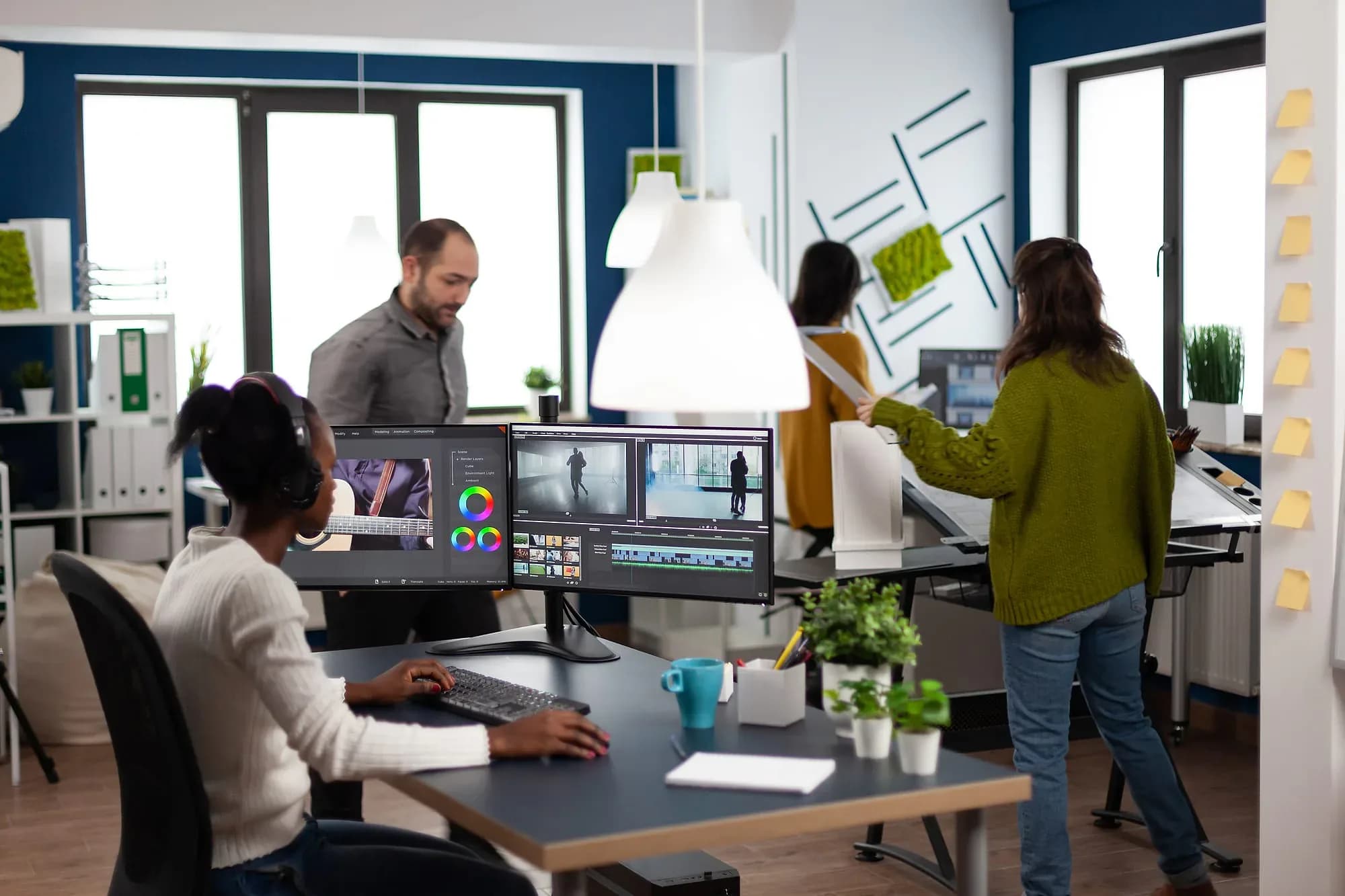 Designer producing motion content for digital signage screens